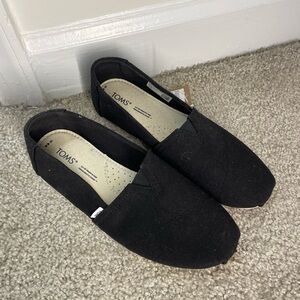 TOMS Black Canvas Slip-On Shoes